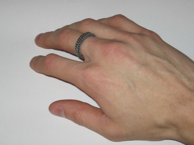 Kabutroid wearing the ring on her right middle finger.