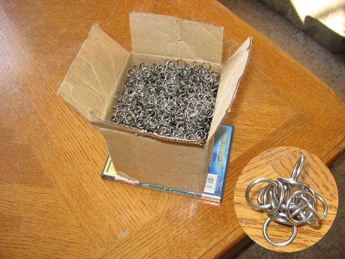 A small cardboard box filled with tetra orbs, and a cutaway of a closeup of one of the orbs.
