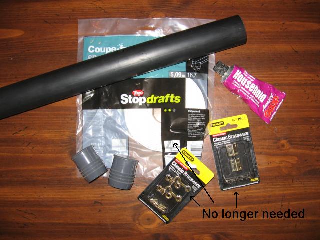 some pvc pipe, glue, and plumbing parts.