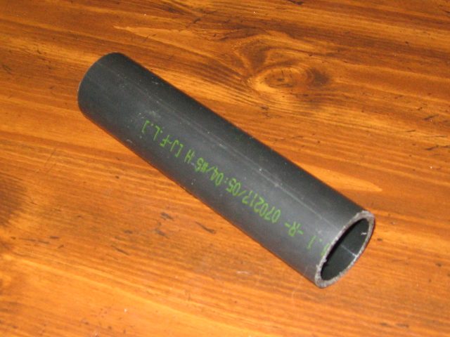 A small chunk of plastic pipe.