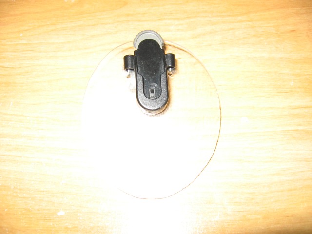 the GPS clip attached to the clear acrylic with wires.