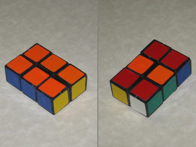 The stickers reapplied to the cube, one pic showing solved and the other showing scrambled. It looks surprisingly good with the stickers applied.