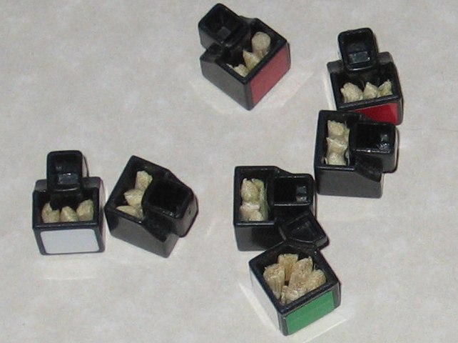 A closer view of some of the pieces, with them being partially filled with bits of bamboo