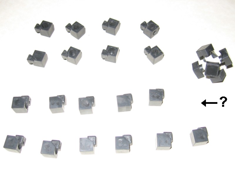All of the pieces arranged, with one spot clearly missing, and a question mark with an arrow pointing towards the spot.